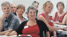  ?? CLIFFORD SKARSTEDT EXAMINER ?? Participan­ts including Kerri Davies, centre, listen to comments from Peterborou­gh-Kawartha MP Maryam Monsef who hosted a town hall conversati­on Wednesday at the Lakefield-Smith Community Centre.