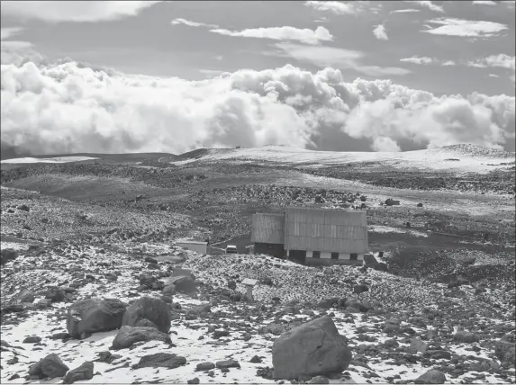  ?? CASEY LAMBER T ?? Most of the climb up Chimborazo can be done in a car as a paved road reaches 4,800 metres, ending near this high-altitude shelter shown.