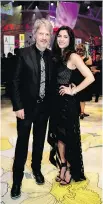  ?? ALLEN MCINNIS ?? THE LOOK OF LOVE: Actor/comedian/director Claude Meunier and fiancée, media personalit­y Virginie Coossa, make an indelible impression on the 2017 Daffodil Ball.