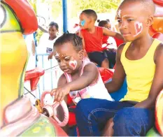  ?? Picture — Memory Mangombe ?? Children enjoy themselves at Longchen Plaza Amusement Park in Harare yesterday.