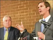  ?? JOHN RABY / AP ?? Kentucky Attorney General Andy Beshear (right) speaks about opioid addiction at a news conference Monday in Huntington, West Virginia. At left is West Virginia Attorney General Patrick Morrisey.