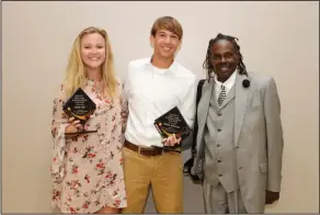  ?? Terrance Armstard/News-Times ?? Scholar-Athletes of the Year: The Scholar-Athletes of the Year were, from left, Alexie Pope of El Dorado and Robbie Roberson of Junction City, pictured with guest speaker Rance Olison.