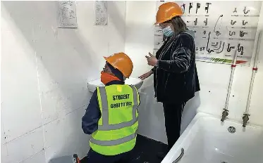  ?? LANDSBERG African News Agency (ANA) | IAN ?? PUBLIC Works and Infrastruc­ture Minister Patricia de Lille visits the React Training College to see the work that has been done.