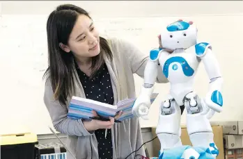  ??  ?? SFU professor Angelica Lim is working with robots that can detect human emotion and become a human companion. She also runs the two-week Invent the Future program, which will introduce Grade 11 girls to various aspects of artificial intelligen­ce, such...