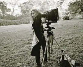  ?? COPYRIGHT R. KIM RUSHING ?? Photograph­er Sally Mann is the subject of a solo exhibition at the High Museum of Art, “Sally Mann: A Thousand Crossings.” Pictured is “Sally with Camera” circa 1998.