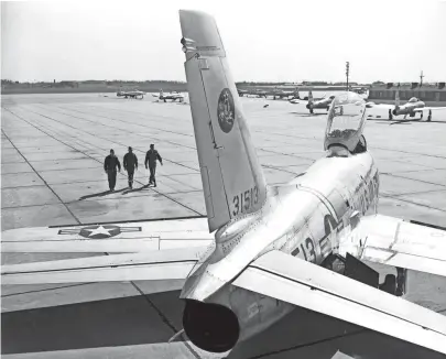  ??  ?? The first two of 25 supersonic F86H Sabrejets to be assigned to the 319th “Chickasaw” Fighter-Bomber Wing of the Air Force Reserve arrive at Municipal Airport during the third week of March 1957. The entire wing is “on the ready” at all times. BARNEY...