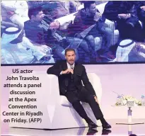  ??  ?? US actor John Travolta attends a panel discussion at the Apex Convention Center in Riyadh on Friday. (AFP)