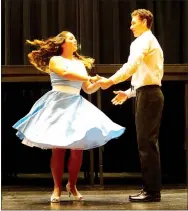  ?? Photo by Randy Moll ?? Rebecca Brown as Eurydice dances with Logan Linton as Orpheus during play practice on Thursday.
