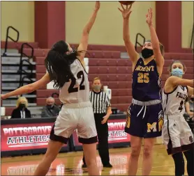  ?? AUSTIN HERTZOG — MEDIANEWS GROUP ?? Mount St. Joseph’s Georgia Pickett (25) shoots a jumper from the free-throw line over Pottsgrove’s Sierra Potts in a District 1-5A playoff game Saturday.