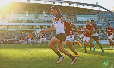  ?? Photo: rugby.com.au ?? Brumbies winger Corey Toole kicks ahead before scoring a classic try against the Highlander­s at the GIO Stadium in Canberra, Australia, on May 15, 2023.