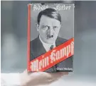  ?? Lennart Preiss / Associated Press ?? The copyright of Adolf Hitler’s “Mein Kampf,” published in 1925, expires in 2015, so it will be widely available in Germany.