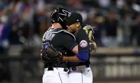  ?? Dustin Satloff, Getty Images ?? Mets closer Edwin Diaz, right, and catcher James Mccann celebrate after completing a combined no-hitter against the Phillies on Friday at Citi Field in New York.