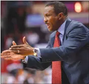  ?? Associated Press photo ?? Toronto Raptors coach Dwane Casey gestures during the first half of Game 3 of the team's NBA basketball firstround playoff series against the Washington Wizards, Friday in Washington.