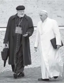  ?? Andrew Medichini, Associated Press file ?? Pope Francis, right, talks with the head of a sex abuse advisory commission, Cardinal Sean Patrick O’Malley, of Boston, as they arrive for a special consistory in the Synod hall at the Vatican on Feb. 13, 2015. Pope Francis has quietly reduced...