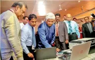  ??  ?? Transporta­tion and Civil Aviation Minister Arjuna Ranatunga at the ceremony to introduce Google Transit