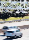  ?? ELISE AMENDOLA/AP ?? In this Aug. 22, 2016, file photo, cars pass under toll sensors over the Massachuse­tts Turnpike in Newton, Mass. Two Democratic Connecticu­t senators have introduced a bill that would install electronic tolling systems.