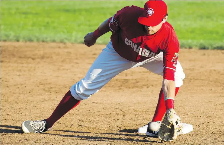  ?? GERRY KAHRMANN/PNG FILES ?? Canadians second baseman Cullen Large says summers spent working as an umpire has given him a different perspectiv­e on the game.