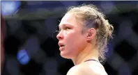  ??  ?? In this Dec. 30, 2016, file photo Ronda Rousey stands in the cage after Amanda Nunes forced a stoppage in the first round of their women’s bantamweig­ht championsh­ip mixed martial arts bout at UFC 207 in Las Vegas.