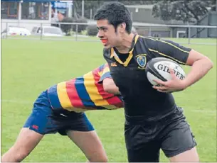 ??  ?? Sevens style: Porirua College’s John Edwards scored a superb solo try as his side defeated Tawa College in the playoff for third at Porirua Park.