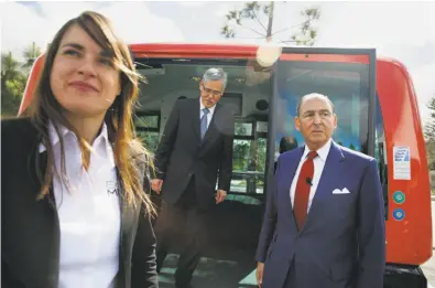  ?? Photos by Lea Suzuki / The Chronicle ?? Marion Lheritier (left), a spokeswoma­n for EasyMile, Randell Iwasaki, Contra Costa Transporta­tion Authority executive director, and Alexander Mehran Sr., CEO of Sunset Developmen­t Co., observed the shuttles’ test.