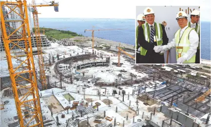  ??  ?? MANILA BAY Resorts will be the third casino-resort to open in Entertainm­ent City. Japanese casino mogul Kazuo Okada and Filipino businessma­n Antonio O. Cojuangco (inset) lead Tuesday’s topping-off ceremony for the project that would be the biggest...