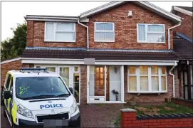  ??  ?? INVESTIGAT­ION: West Midlands Police outside a house in Wolverhamp­ton