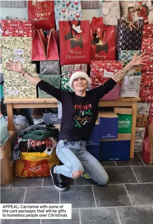  ?? ?? APPEAL: Carrianne with some of the care packages that will be gifts to homeless people over Christmas