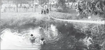  ??  ?? Scouts taking part in commando training.