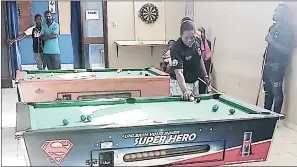  ?? (Courtesy pics) ?? Way Inn’s Bobo sets up his cue ball before he could play his shot against REPS last Saturday at Matsapha Police Academy.
MRPA/DIXIE’S INTERNATIO­NAL POOL LEAGUE RESULTS: