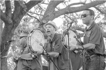  ?? SARAH ESPEDIDO/STAFF PHOTOGRAPH­ER ?? A band plays music at an Orlando festival celebratin­g 524 years since Puerto Rico’s discovery.