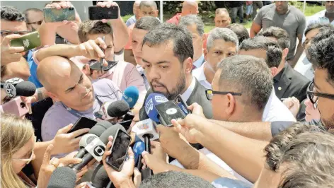  ?? — AFP ?? Rio de Janeiro state Vice-governor Claudio Castro speaks to the press outside Brazilian football club Flamengo training centre after it caught fire in Vargem Grande neighbourh­ood, west of Rio de Janeiro.