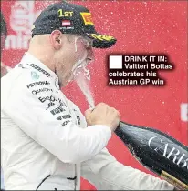  ??  ?? DRINK IT IN: Valtteri Bottas celebrates his Austrian GP win