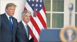  ?? Alex Brandon Associated Press ?? PRESIDENT Trump announces his nomination of Jerome Powell, right, a Federal Reserve governor since 2012, to replace Janet L. Yellen as Fed chairman.