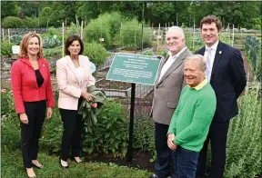  ?? SUBMITTED PHOTO ?? The unveiling of the new sign dedicating Springton Manor Farm’s garden as the Senator Andrew Dinniman Garden. Celebratin­g the moment are, from left, Chester County Commission­ers Michelle Kichline and Marian Moskowitz; former Sen. Andy Dinniman; Bob McNeil, founding and current Board Chair of the Chester County Food Bank; and Commission­er Josh Maxwell.