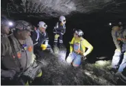  ?? Timothy D. Easley / Associated Press 2015 ?? Mining safety official Patricia Silvey (center) said 10 coal miners have died on the job so far this year.