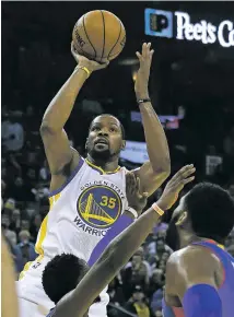  ?? KATHY WILLENS/ASSOCIATED PRESS FILE PHOTO ?? In today’s NBA, the best contempora­ry big men are mold breakers, like Kevin Durant, left, a lanky shooter, and unlike Greg Oden, right, a traditiona­l center who played under the basket.