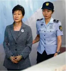  ?? Kim Hong-ji - 25.ago.17/Associated Press ?? Park Geun-hye, numa audiência do julgamento em agosto