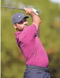  ?? ERIC CHRISTIAN SMITH/AP ?? Jason Day hits his tee shot on the 17th hole during the third round of the Houston Open on Saturday in Houston. Day enters the final round one shot off the lead, seeking his first PGA Tour victory in more than two years.