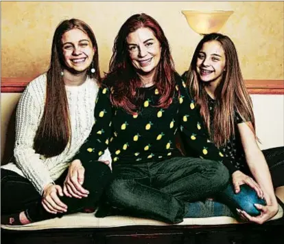  ?? NUCCIO DINUZZO/CHICAGO TRIBUNE ?? Kimberley Watry with daughters Olivia, 17, and Norah, 12. Watry says after Olivia was taken advantage of in a friendship, she steps in more with Norah.