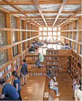  ??  ?? People read at Liyuan Library on the outskirts of Beijing. — AFP photos