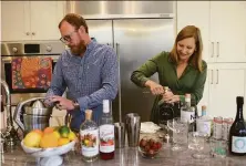  ?? Erik Castro / Special to The Chronicle ?? Dry Goods Beverage founders Jake Krausz (left) and Adrienne Stillman Krausz make nonalcohol­ic drinks.