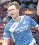  ??  ?? Matchwinne­r Liam Craig celebrates after netting both Saints goals