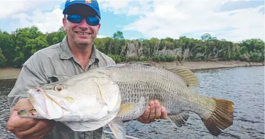  ??  ?? Rob D'antonio with a Finniss River barra, caught with Jason 'Back-Cast' Rogers of geoffcorry.com