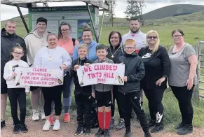  ??  ?? Raising cash The climb up Tinto Hill for Clare McCulloch raised vital funds