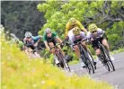  ?? BERNARD PAPON/ASSOCIATED PRESS ?? Italy’s Fabio Aru, third from left, is a spot in front of eventual stage winner Romain Bardet during a downhill segment Thursday.