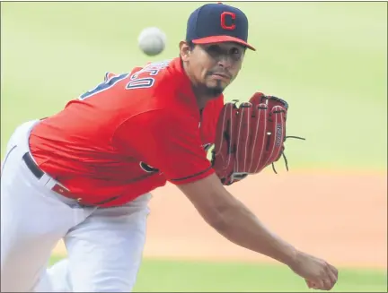  ?? TIM PHILLIS — FOR THE NEWS-HERALD ?? Carlos Carrasco delivers to the Cubs on Aug. 12 at Progressiv­e Field.