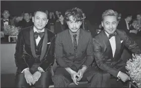  ?? PHOTOS PROVIDED TO CHINA DAILY ?? From top: The cover of GQ China’s September issue shows the 10 GQ 2017 Men of the Year. Paco Tang, publisher of GQ China, believes that men should also have a profound understand­ing of the world. Tang with Duan Yihong (middle) and Wu Xiubo, two actors...