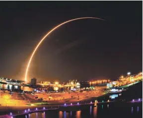  ??  ?? This is a launch of the SpaceX Falcon 9 rocket carrying a Telstar 19v communicat­ions satellite at Cape Canaveral Air Force Station. This is an approximat­e three minute time exposure of the launch illuminati­ng the sky over Port Canaveral viewed from Exploratio­n Tower. MALCOLM DENEMARK / FLORIDA TODAY/USA TODAY NETWORK