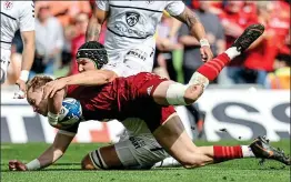  ?? ?? HIGH POINT: Munster’s Mike Haley scores a try against Toulouse