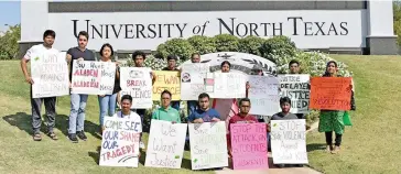  ??  ?? Bangladesh­i students at the University of North Texas hold a protest at their university.